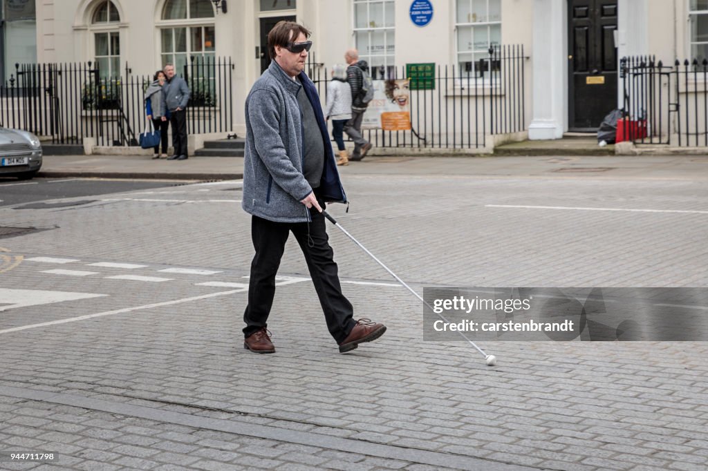 Blind man in a street