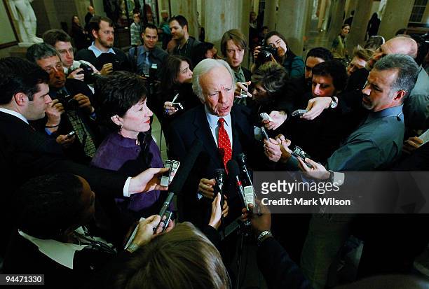 Sen. Joseph Lieberman speaks to reporters about the health care reform bill that is currently being debated in the Senate, as Sen. Susan Collins...