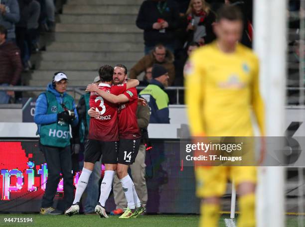 Martin Harnik of Hannover celebrates after scoring his team`s first goal with Miiko Albornoz of Hannover during the Bundesliga match between Hannover...