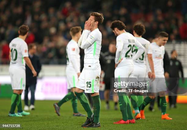 Sebastian Langkamp of Bremen looks dejected after the Bundesliga match between Hannover 96 and Werder Bremen at HDI Arena on April 06, 2018 in...