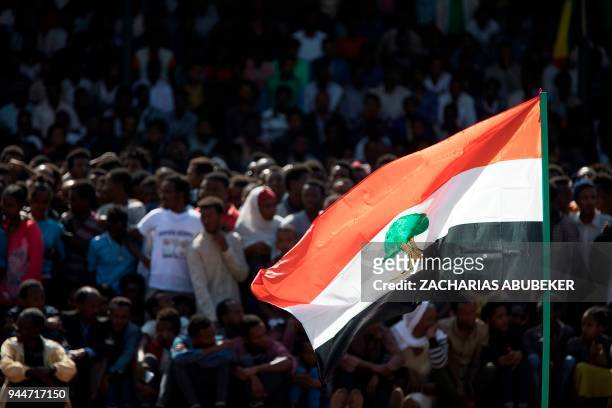 Picture taken on April 11, 2018 shows an Oromo flag during the rally of Ethiopia's new Prime Minister in Ambo, about 120km west of Addis Ababa,...