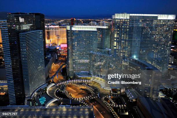 The Vdara Hotel and Spa, left, and ARIA Resort and Casino stand at the MGM Mirage CityCenter complex in Las Vegas, Nevada, U.S., on Monday, Dec. 14,...