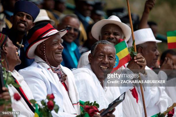 Oromo Elders, or Baba gada, react during the rally of Ethiopia's new Prime Minister in Ambo, about 120km west of Addis Ababa, Ethiopia. / AFP PHOTO /...