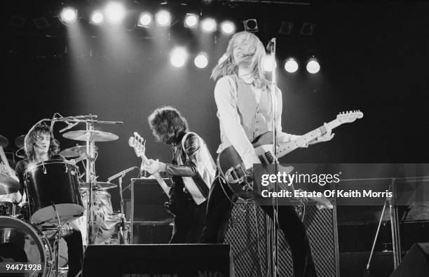 American singer-songwriter and musician Tom Petty performs live with the Heartbreakers, circa 1977. Behind him is bassist Ron Blair.