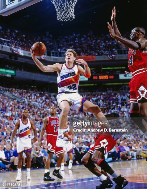 June 13: Danny Ainge of the Phoenix Suns shoots the ball against the Chicago Bulls during game 2 of the 1993 NBA Finals on June 13, 1993 at America...