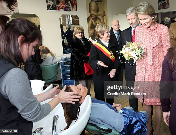 Prince Philippe and Princess Mathilde from Belgium visit a hairdressing course at the Institute Technique Provincial on December 15, 2009 in...