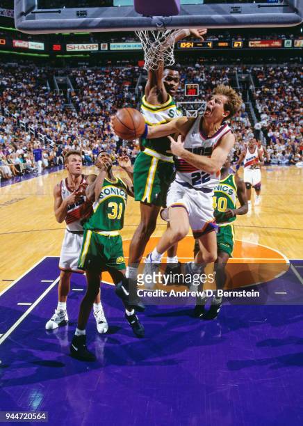 Danny Ainge of the Phoenix Suns shoots the ball against the Seattle SuperSonics during game 1 of the 1993 Western Conference Finals on May 24, 1993...