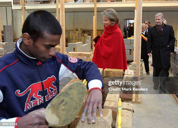 Princess Mathilde and Prince Philippe of Belgium visits a construction course at the Institute Technique Provincial on December 15, 2009 in...