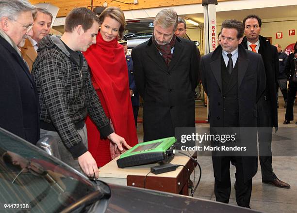 Princess Mathilde and Prince Philippe of Belgium visit a car mechanics course at the Institute Technique Provincial on December 15, 2009 in...