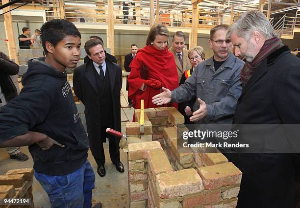 Princess Mathilde and Prince Philippe of Belgium visits a construction course at the Institute Technique Provincial on December 15, 2009 in...