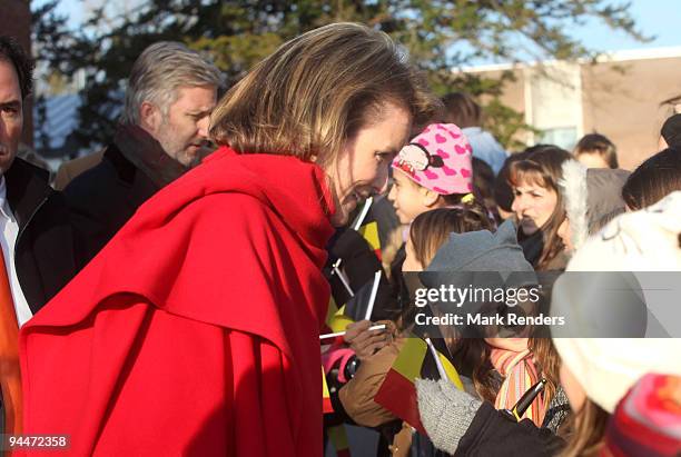 Princess Mathilde and Prince Philippe of Belgium talk to students at the Institute Technique Provincial on December 15, 2009 in Mont-Saint-Guibert,...