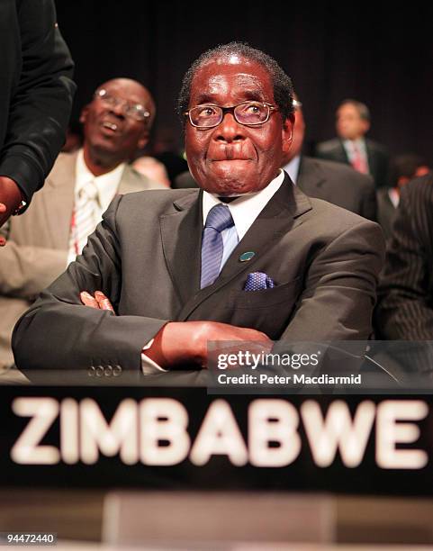 President Robert Mugabe of Zimbabwe looks up as he attends the opening ceremony of the High Level Segment of The United Nations Climate Change...