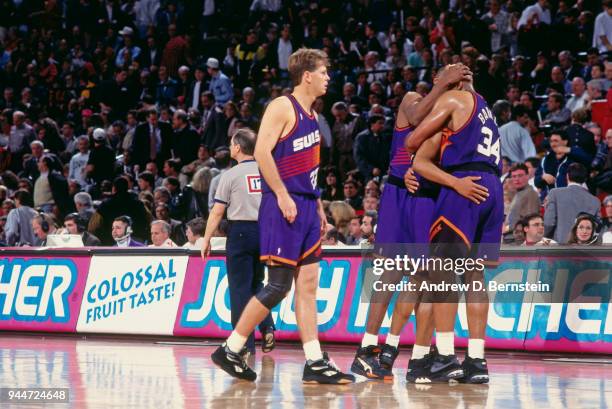 Danny Ainge and Charles Barkley of the Phoenix Suns react during the game against the Boston Celtics at the Boston Garden on April 2, 1993 in Boston,...