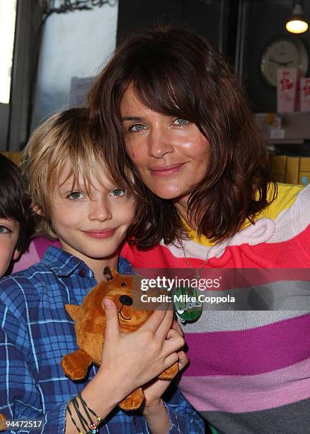 Model Helena Christensen and son Mingus attend the screening of "Fantastic Mr. Fox" at Tribeca Cinemas on November 8, 2009 in New York City.