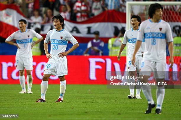 Kim Hyun Gil of Pohang Steelers, Shin Yung Min, Hwang Jae Won and Namkung Do look dejected are Estudiantes scored the fiirst goal during the FIFA...