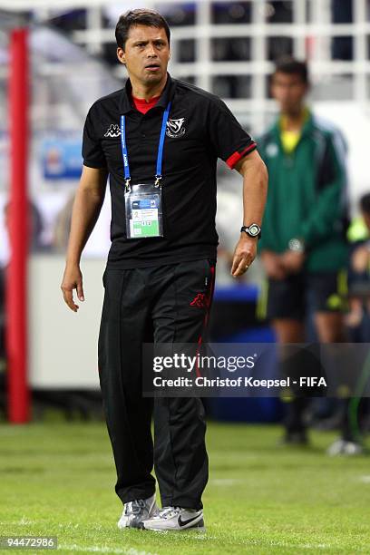 Head coach Sergio Farias of the Pohang Steelers looks thoughtful during the FIFA Club World Cup semi-final match between Pohang Steelers and...