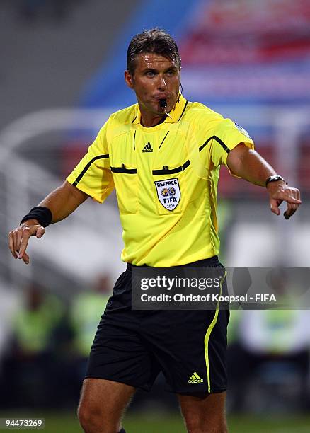 Referee Roberto Rosetti of Italy issues instructions during the FIFA Club World Cup semi-final match between Pohang Steelers and Estudiantes LP at...