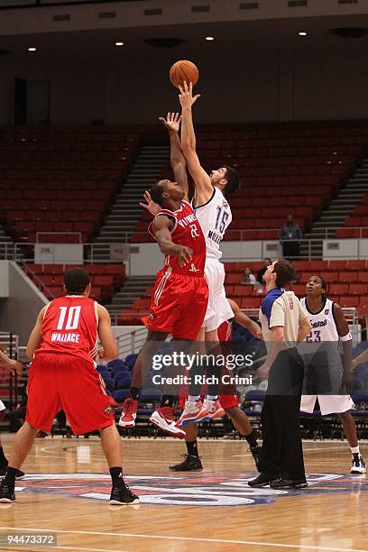 Byron Mullens of the Tulsa 66ers and Joey Dorsey of the Rio Grande Valley Vipers go after the jump ball during the NBA D-League game at the Tulsa...