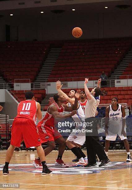 Byron Mullens of the Tulsa 66ers and Joey Dorsey of the Rio Grande Valley Vipers go after the jump ball during the NBA D-League game at the Tulsa...