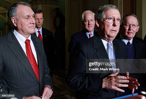 Senate Minority Leader Mitch McConnell speaks about the health care bill while flanked by Sen. Lamar Alexander , Sen. John Cornyn , John Thune and...