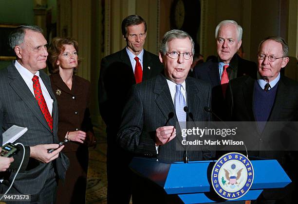 Senate Minority Leader Mitch McConnell speaks about the health care bill while flanked by Sen. Jon Kyl , Sen. Lisa Murkoski , John Thune , Sen. John...