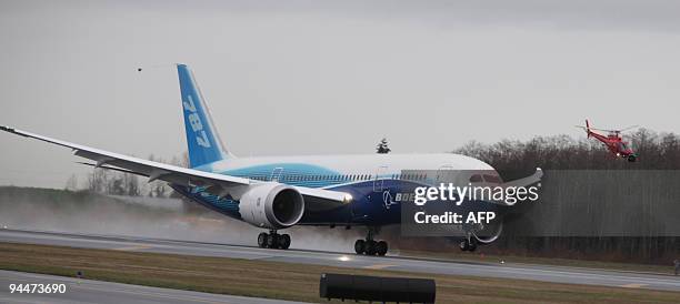 Boeing's long delayed new 787 Dreamliner takes to the sky at Paine Field in Everett, Washington on December 15, 2009. Under dreary skies, the...