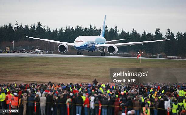 Boeing's long delayed new 787 Dreamliner takes to the sky at Paine Field in Everett, Washington on December 15, 2009. Under dreary skies, the...