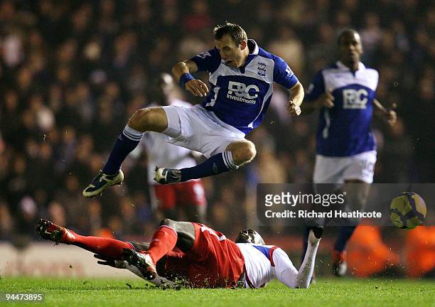 Lee Bowyer of Birmingham is tackled by Christopher Samba of Blackburn during the Barclays Premier League match between Birmingham City and Blackburn...