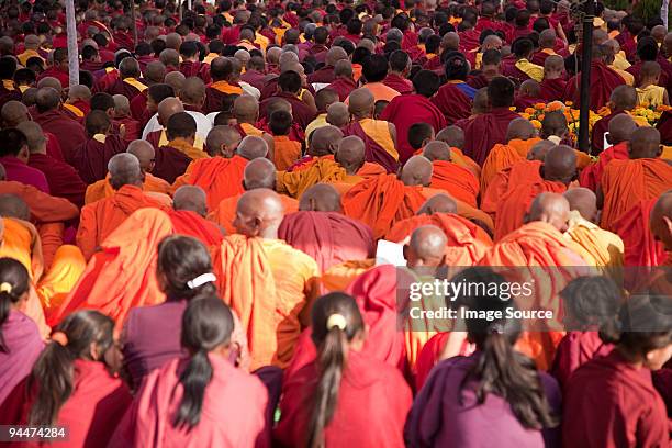 buddhist monks during prayer in lumbini nepal - buddhism at lumbini stock pictures, royalty-free photos & images