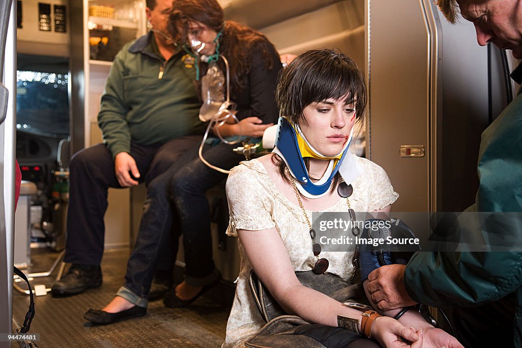 Young woman receiving medical attention