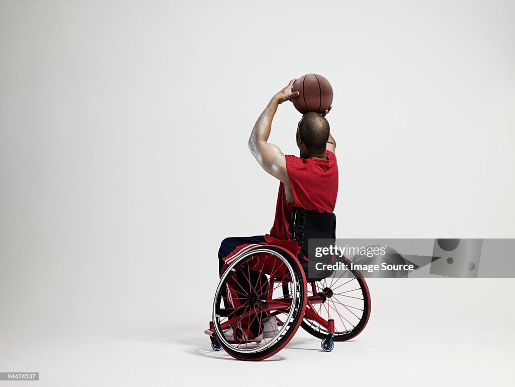 Wheelchair basketball player shooting