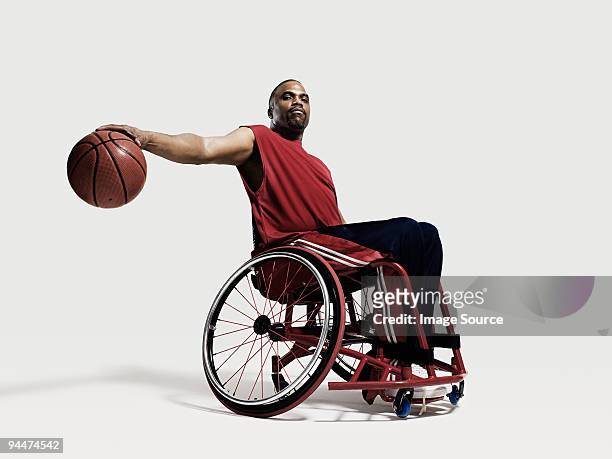 バスケットボール選手車椅子 - man in wheelchair ストックフォトと画像