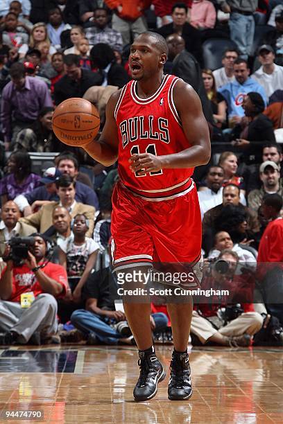 Lindsey Hunter of the Chicago Bulls brings the ball upcourt against the Atlanta Hawks during the game on December 9, 2009 at Philips Arena in...