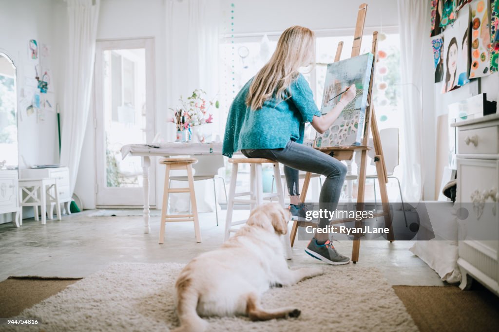 Woman Painting at Home Art Studio