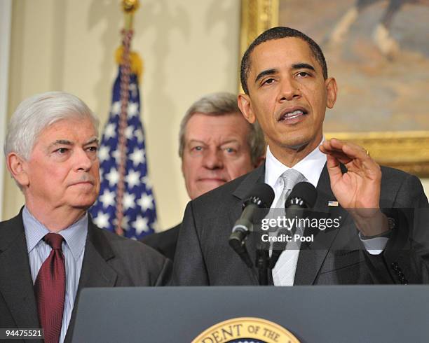President Barack Obama speaks to the press with Sen. Chris Dodd and Sen. Max Baucus in the Roosevelt Room in the Eisenhower Executive Office Building...