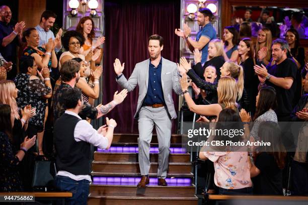 Ike Barinholtz greets the audience during "The Late Late Show with James Corden," Monday, April 9, 2018 On The CBS Television Network.