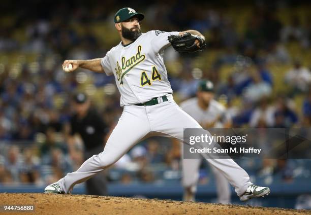 Chris Hatcher of the Oakland Athletics pitches during a game against the Los Angeles Dodgers at Dodger Stadium on April 10, 2018 in Los Angeles,...