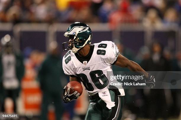 Reggie Brown of the Philadelphia Eagles runs the ball against the New York Giants at Giants Stadium on December 13, 2009 in East Rutherford, New...