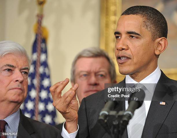 President Barack Obama speaks to the press with Sen. Chris Dodd and Sen. Max Baucus in the Roosevelt Room in the Eisenhower Executive Office Building...
