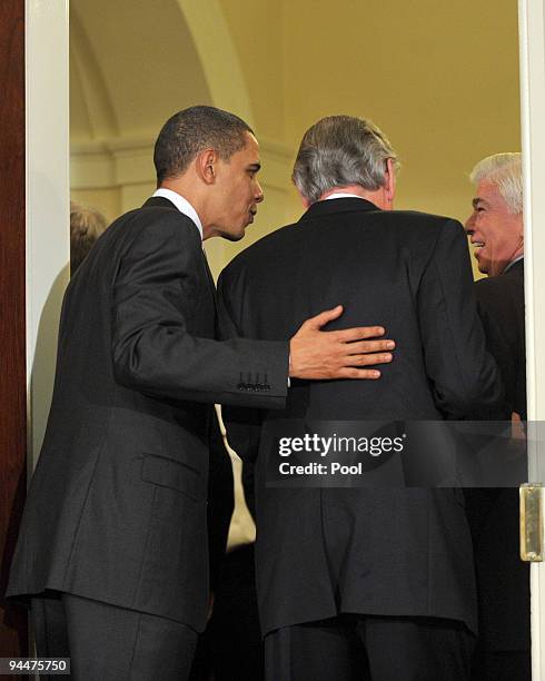 President Barack Obama walks out with Sen. Tom Harkin and Sen. Chris Dodd after speaking to the press in the Roosevelt Room in the Eisenhower...