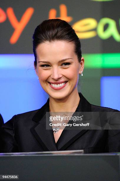 Happy Hearts founder and chair, Petra Nemcova, rings the NASDAQ closing bell on December 15, 2009 in New York City.