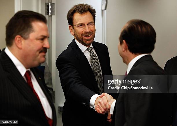 Warner Music Group CEO Edgar Bronfman is greeted by Viacom Chairman and CEO Philippe Dauman and The International Alliance of Theatrical Stage...