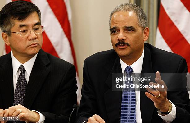 Attorney General Eric Holder makes brief remarks during a roundtable discussion enforcing laws against the piracy of intellectual property with...