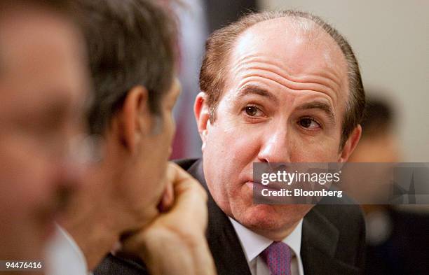 Philippe Dauman, chairman and chief executive officer of Viacom Inc., right, speaks to Michael Lynton, chairman and chief executive officer of Sony...