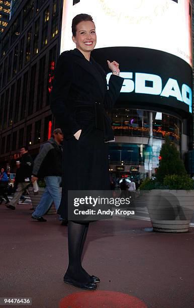 Petra Nemcova poses after ringing the closing bell at the NASDAQ MarketSite on December 15, 2009 in New York City.