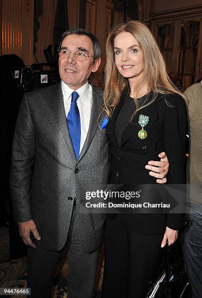 French actress Cyrielle Clair and her friend Michel Corbiere pose after being decorated by French Minister of Culture Frederic Mitterand at Ministere...
