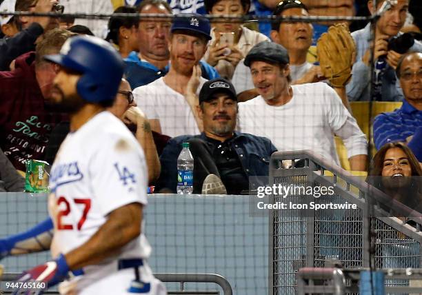 Actor Brad Pitt watches a baseball game between the Los Angeles Dodgers and the Oakland Athletics on April 10 at Dodger Stadium in Los Angeles, CA.