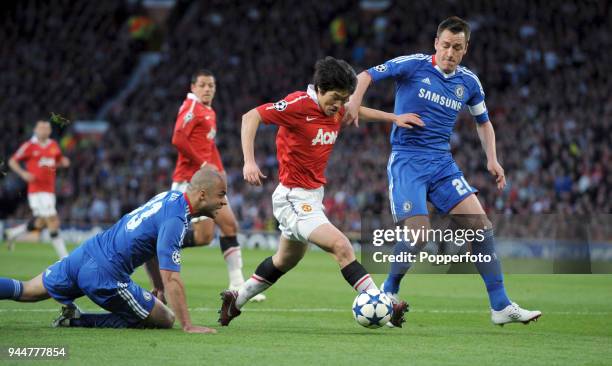 John Terry of Chelsea and Ji-Sung Park of Manchester United battling for the ball during the UEFA Champions League Quarter-Final second leg match...