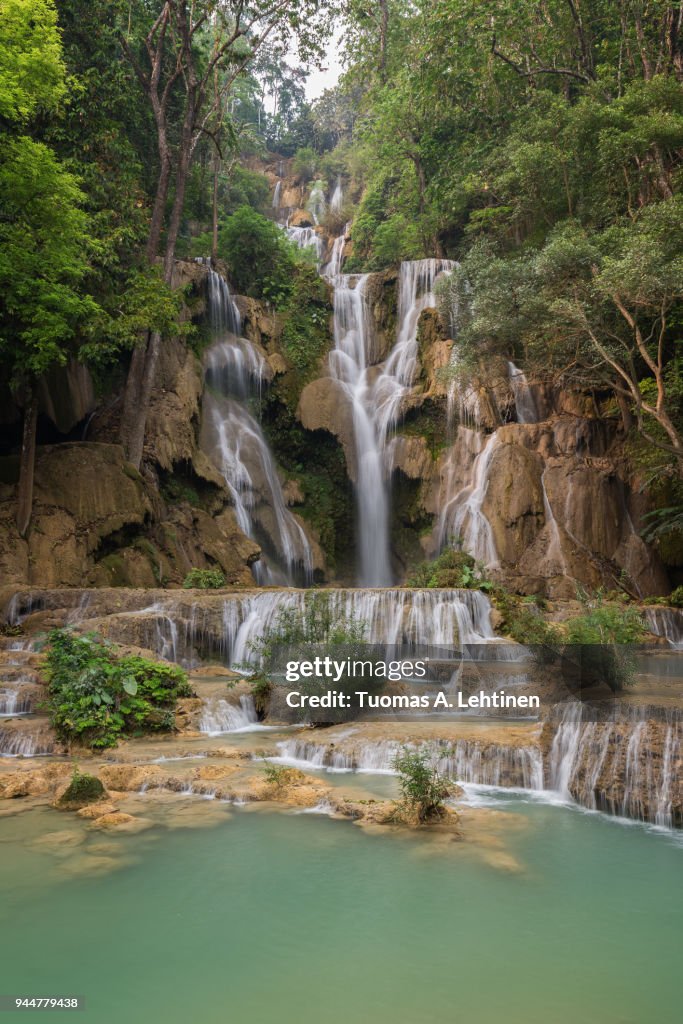 Beautiful view of the main fall at the Tat Kuang Si Waterfalls near Luang Prabang in Laos.