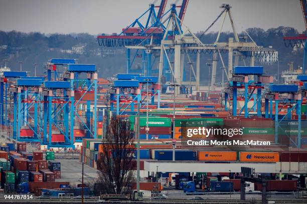 Shipping containers stand stacked at Hamburg Port on April 11, 2018 in Hamburg, Germany. Hamburg Port is Germany's biggest port and handles...